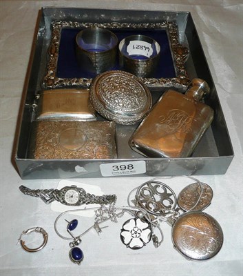 Lot 398 - A silver hipflask, a silver cigarette case, two silver napkin rings, a silver photograph frame,...