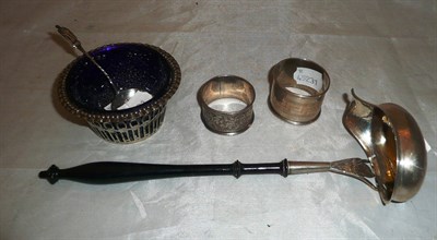 Lot 410 - A silver sugar bowl, glass liner, two napkin rings, a sugar spoon and a punch ladle