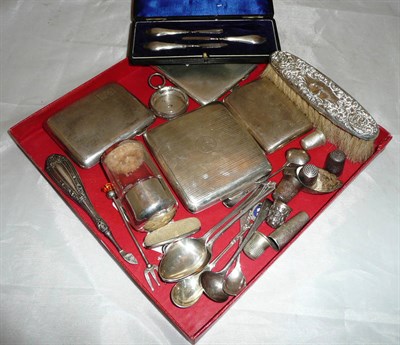 Lot 415 - Four silver cigarette cases, silver mounted clothes brush, silver pocket watch case, teaspoons,...