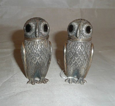 Lot 435 - A pair of white metal owl condiments, stamped 925