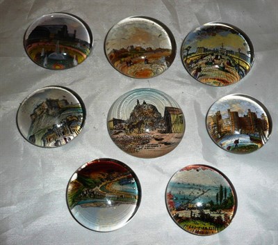 Lot 444 - Eight glass printed paperweights