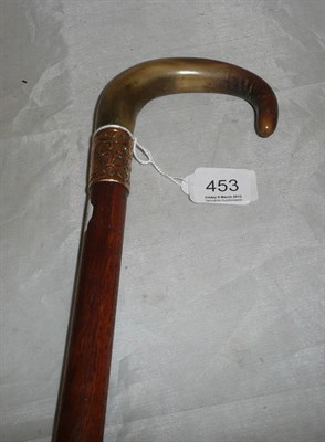 Lot 453 - A walking stick with gold mount