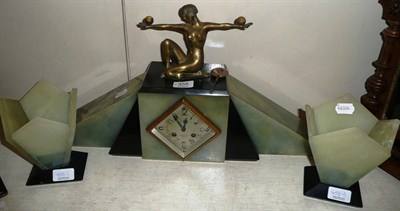 Lot 458 - An Art Deco clock garniture