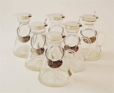 Lot 468 - A Matched Set of Six Silver Mounted Whiskey Tots, four Hukin & Heath Ltd, Birmingham 1924, two...