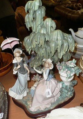 Lot 482 - A large Lladro figure group of two ladies beneath a willow tree