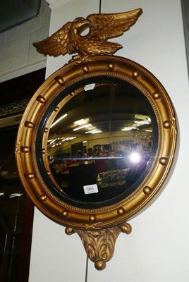 Lot 565 - A Regency style convex mirror