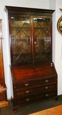 Lot 566 - A mahogany glazed bureau bookcase