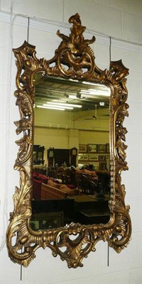 Lot 575 - Ornate gilt framed mirror