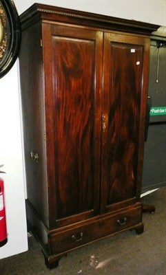 Lot 578 - A mahogany campaign wardrobe