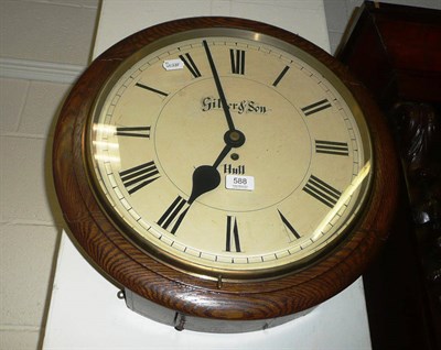 Lot 588 - Oak circular wall clock signed Gilder and Son Hull