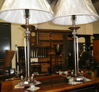 Lot 624 - A pair of decorative lamps and shades