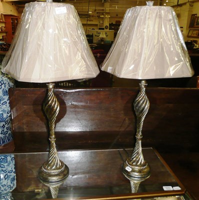 Lot 627 - A pair of decorative lamps and shades