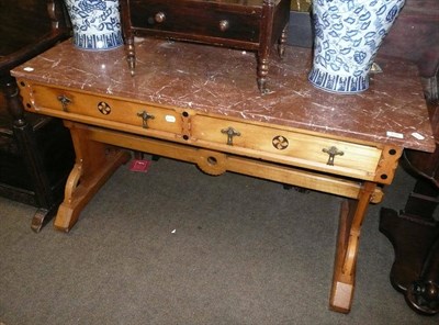 Lot 638 - A Gothic reform marble topped inlaid oak side table with two drawers, stamped Robson of Newcastle