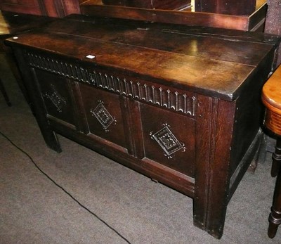 Lot 648 - A 18th century carved and panelled coffer