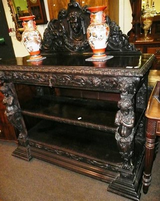 Lot 653 - A heavily carved oak Victorian buffet