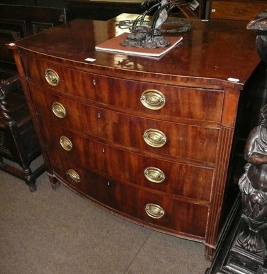 Lot 655 - Early 19th century bow-fronted mahogany four height chest of drawers