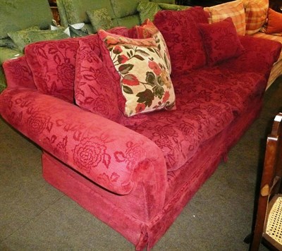 Lot 665 - A large modern Duresta three seater settee upholstered in red self-patterned chenille and cushions