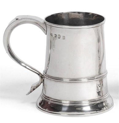 Lot 486 - A George III Silver Mug, John King, London 1775, the tapering body with a single reeded band to the