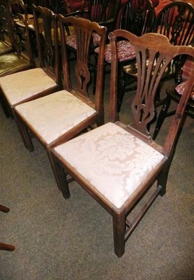 Lot 668 - Three 19th century mahogany dining chairs