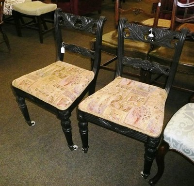 Lot 670 - A pair of ebonised Victorian side chairs.