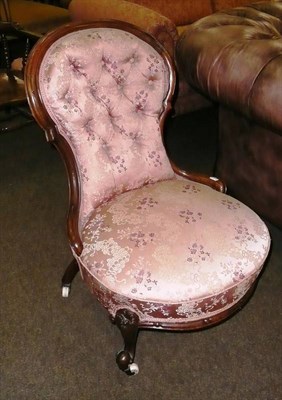 Lot 677 - Walnut Victorian nursing chair