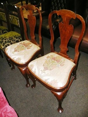 Lot 687 - A pair of walnut Queen Anne style dining chairs with heart shaped splat