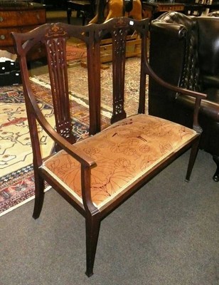 Lot 689 - Edwardian inlaid mahogany settle with upholstered seat