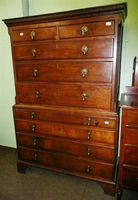 Lot 724 - A Georgian oak chest on chest