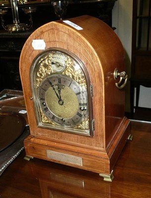 Lot 730 - Mahogany inlaid mantel clock, Kirk & Co Hull, with presentation plaque