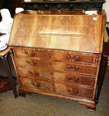 Lot 731 - A Georgian mahogany bureau