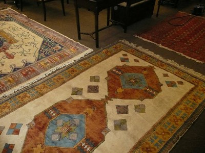 Lot 733 - A Kozak Rug, West Anatolia 241cm by 160cm, and two other rugs (3)