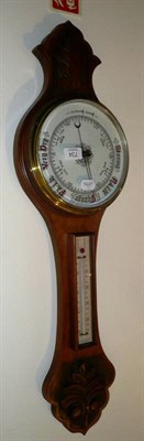 Lot 734 - Carved oak aneroid barometer