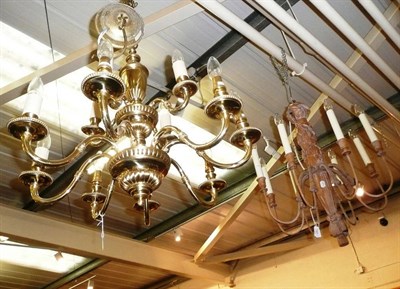 Lot 747 - Decorative composition eight branch chandelier and a brass two tier chandelier (2)