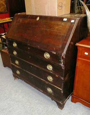 Lot 803 - An oak bureau