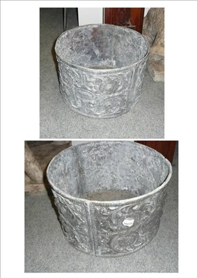 Lot 893 - A pair of circular lead planters