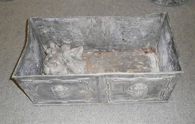 Lot 894 - A rectangular lead planter and a lead lion's head fountain head