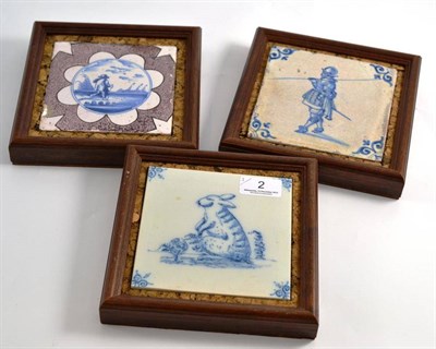 Lot 2 - Three framed 19th century pottery tiles in blue, white and manganese