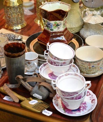 Lot 7 - Six cups and tea bowls, pair lead horn trainers, brass comb, and two horn beakers and a Maling jug