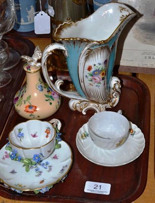 Lot 21 - A Meissen cup and saucer, a Nymphenburg cup and saucer, Jacob Petit vase and cover and another