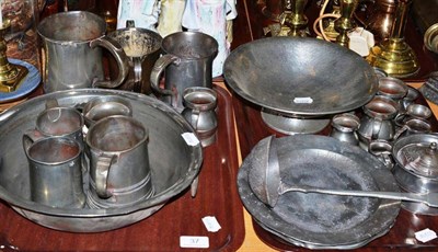 Lot 37 - Tudric pewter hammered comport, pewter plates, flagons, ladle etc (two trays)