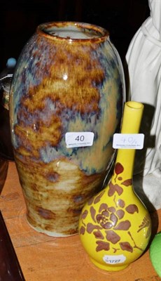 Lot 40 - A Chinese ovoid brown and purple glaze vase and a yellow bottle vase (2)