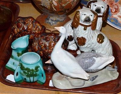 Lot 43 - Pair of small Staffordshire dogs with copper lustre patches, pair of pottery lion window stops,...