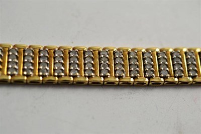 Lot 64 - A 9ct gold diamond set bracelet