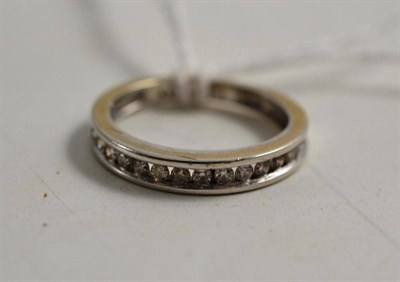 Lot 85 - A diamond half eternity ring