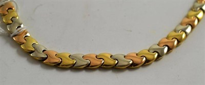 Lot 91 - An 18ct gold fancy link, three colour necklace