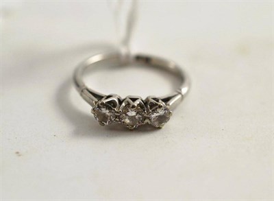 Lot 103 - A diamond three stone ring, 0.50 carat total estimated diamond weight - stamped 'PLAT'