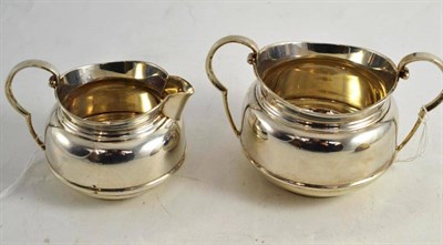 Lot 106 - Silver sugar basin and cream jug