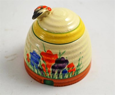 Lot 107 - A Clarice Cliff Crocus pattern honey pot