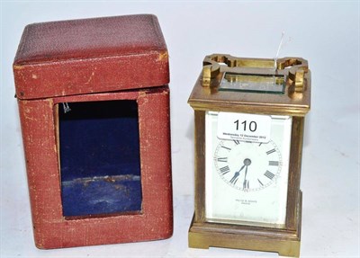 Lot 110 - A Reid and Sons carriage clock and case with key