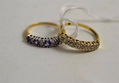 Lot 150 - A 9ct gold and diamond half eternity ring and a 9ct gold tanzanite and diamond ring